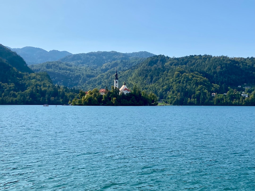 Krn Lake Julian Alps Slovenia glacial turquoise water mountain reflection