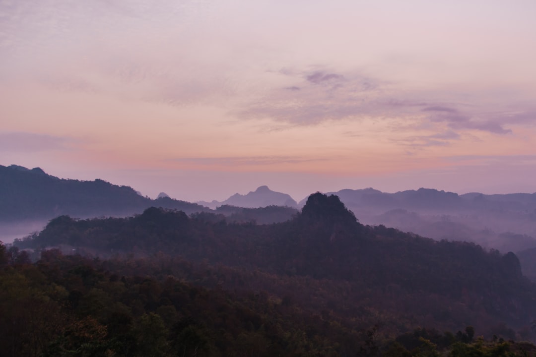 Doi Inthanon summit chedi Thailand golden spire morning mist